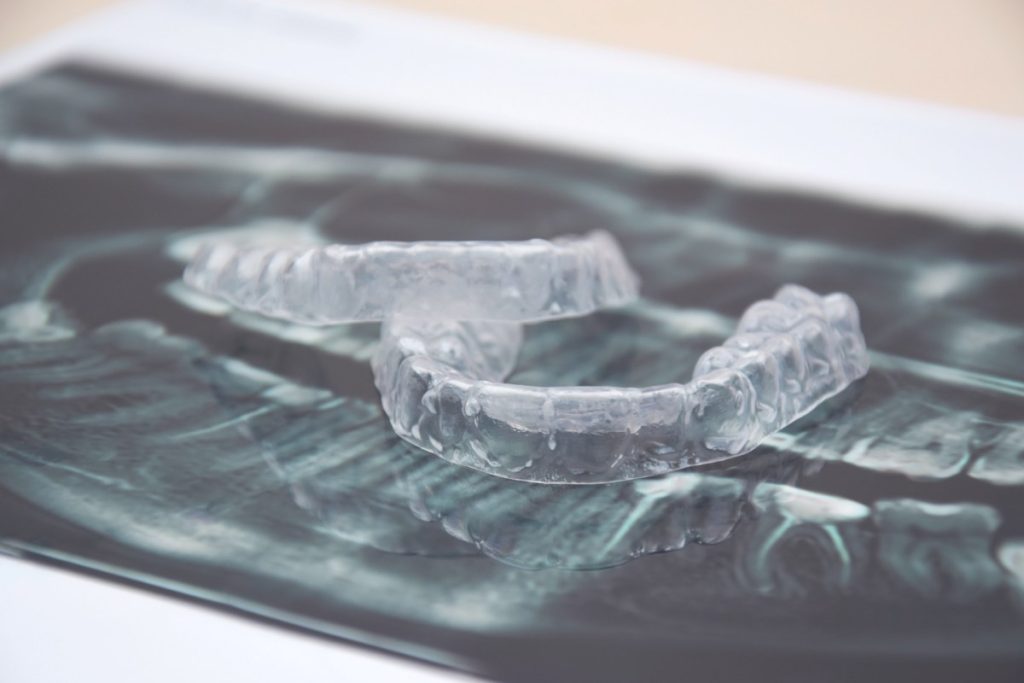 The transparent mouth guards for teeth at night after wearing braces