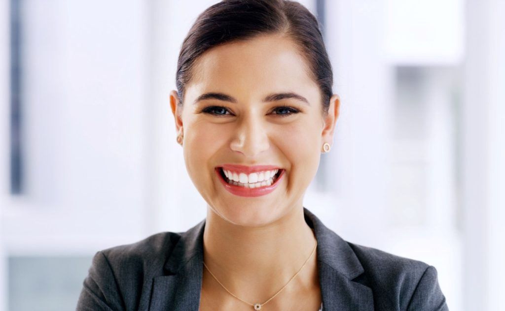 Smile, professional and portrait of business woman in office for confidence